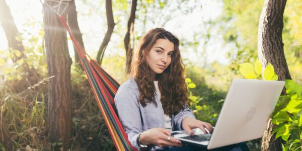 Freelancing czy praca na etacie – co bardziej się opłaca w 2026 roku? 17 young beautiful woman in nature lying in a hammoc 2026 01 09 07 56 54 utc