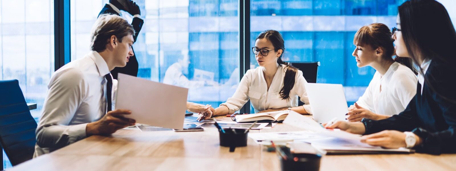 colleagues working on business strategy at confere 2026 01 09 08 12 09 utc