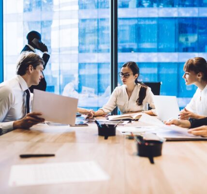 colleagues working on business strategy at confere 2026 01 09 08 12 09 utc