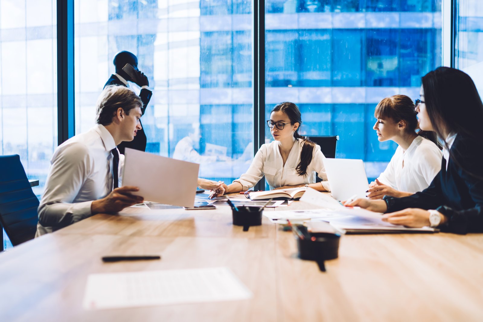 colleagues working on business strategy at confere 2026 01 09 08 12 09 utc